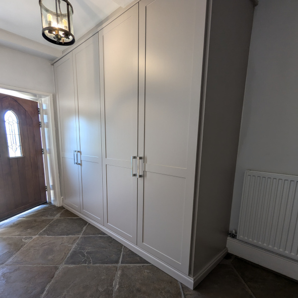 Light grey shaker hallway cupboard storage in Tameside